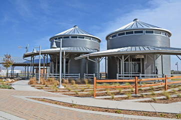 View of grain-bin like round structures that house the restrooms